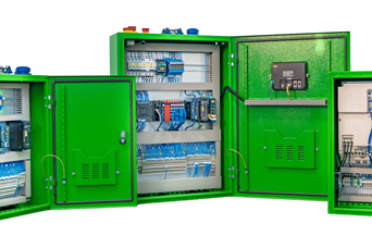 Four green electrical control cabinets with open doors, displaying internal wiring and components.